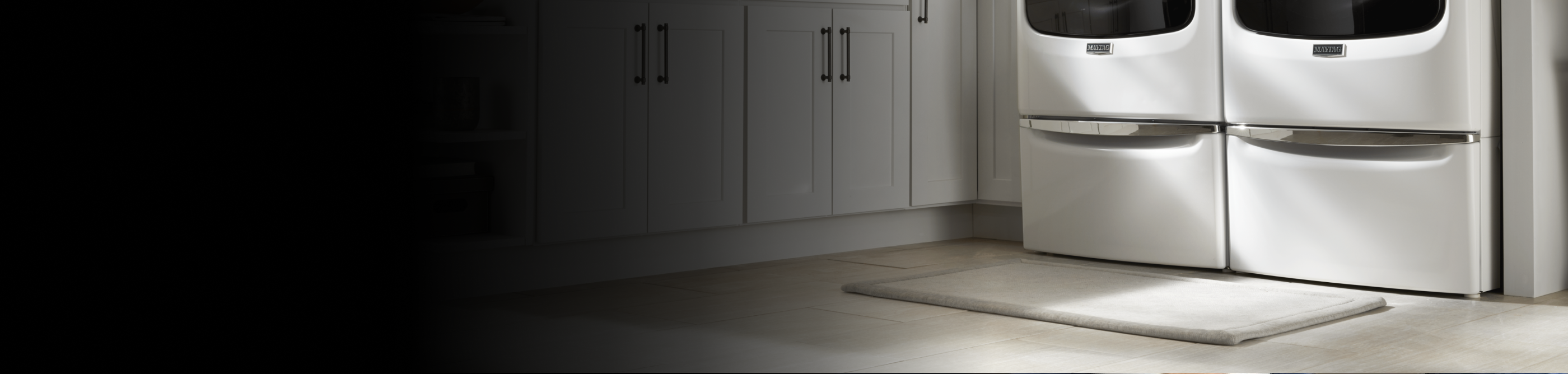 Maytag® washer and dryer on pedestals