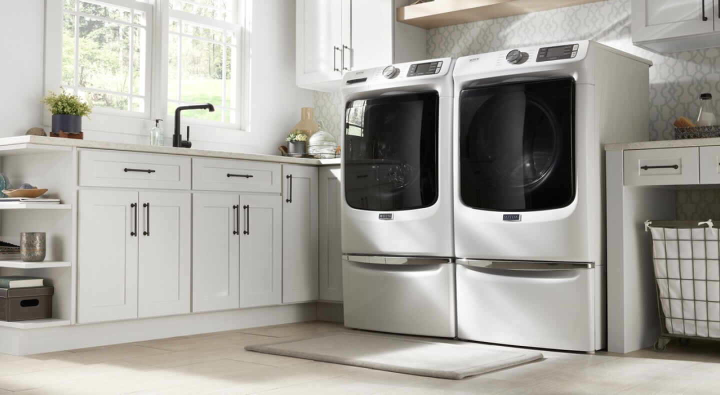 A Maytag® front-load washer and dryer set with Extra Power