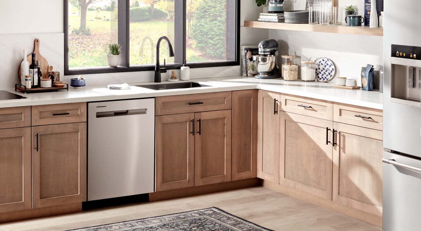 Flush dishwasher next to modern cabinetry
