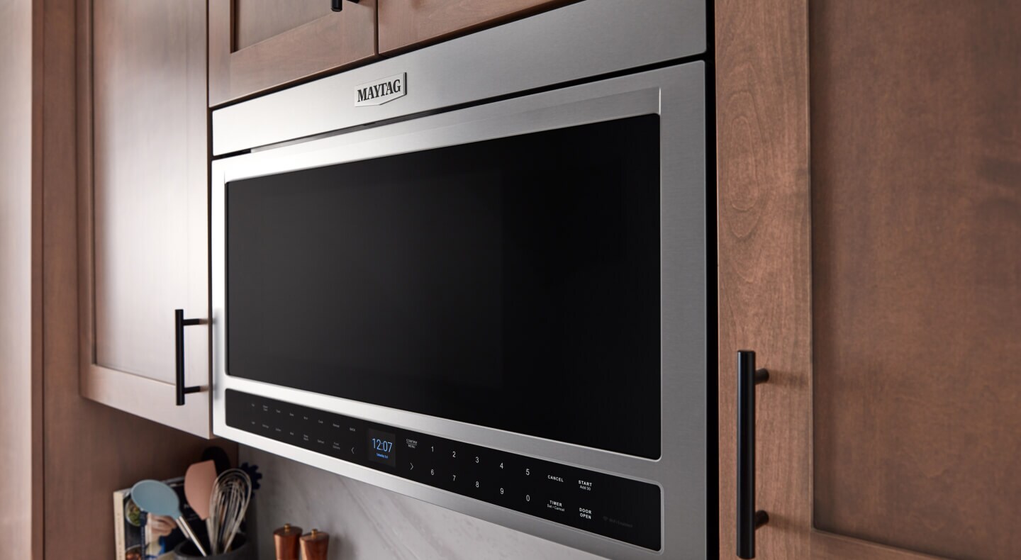 A close-up of a Maytag® over-the-range microwave