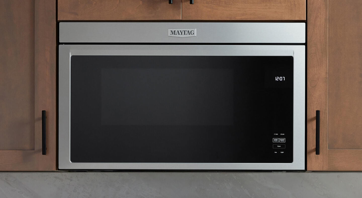 A close-up of a Maytag® over-the-range microwave