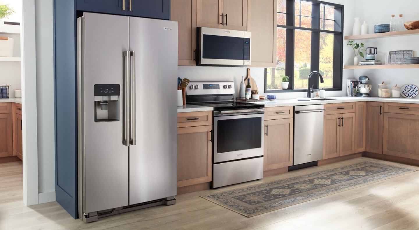 Maytag® side-by-side refrigerator in a modern kitchen