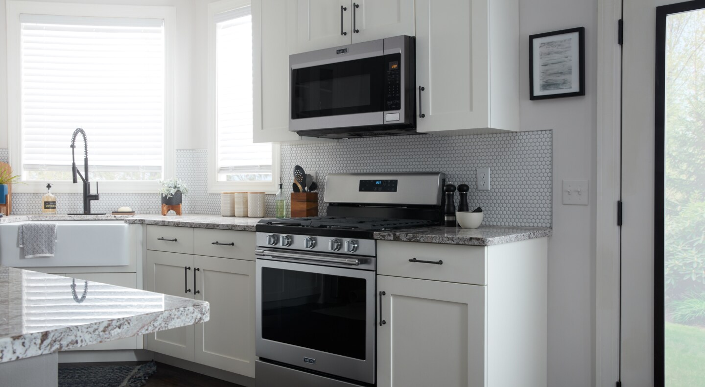 Kitchen view of over-the-range Maytag® microwave