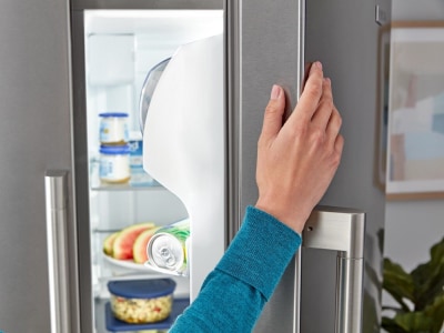 Hand opening refrigerator door