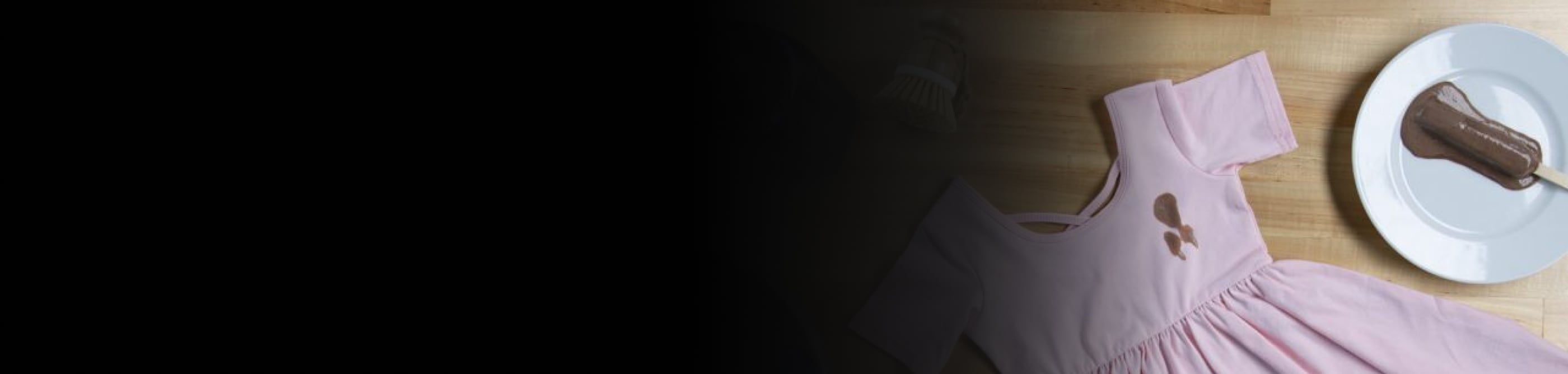 Chocolate stain on a baby pink shirt