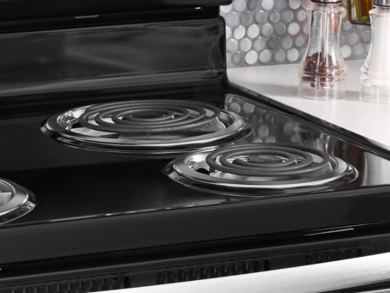 The top of an electric stove with coil burners. The top of an electric stove with coil burners.