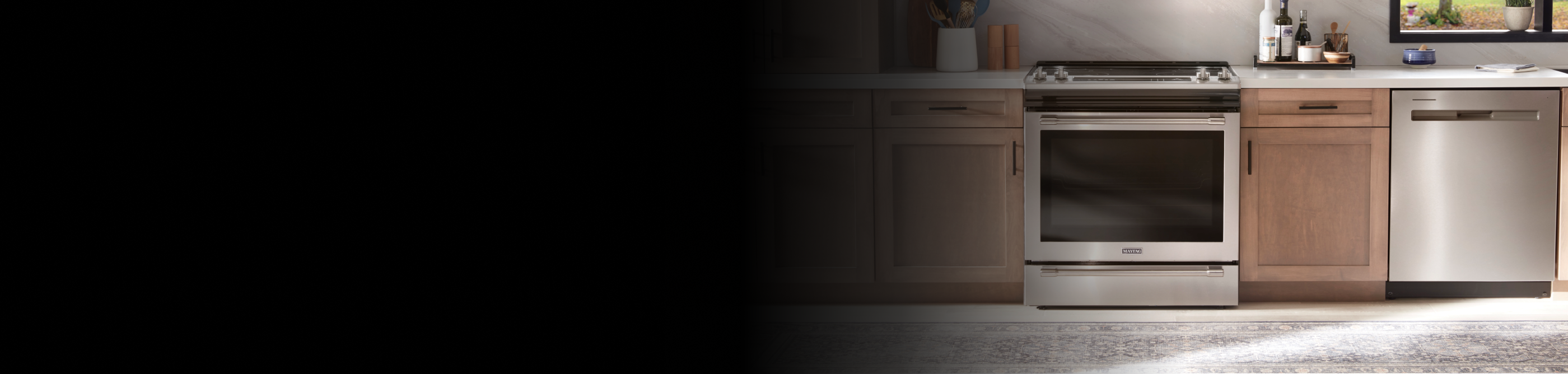 A Maytag® electric range in a modern kitchen