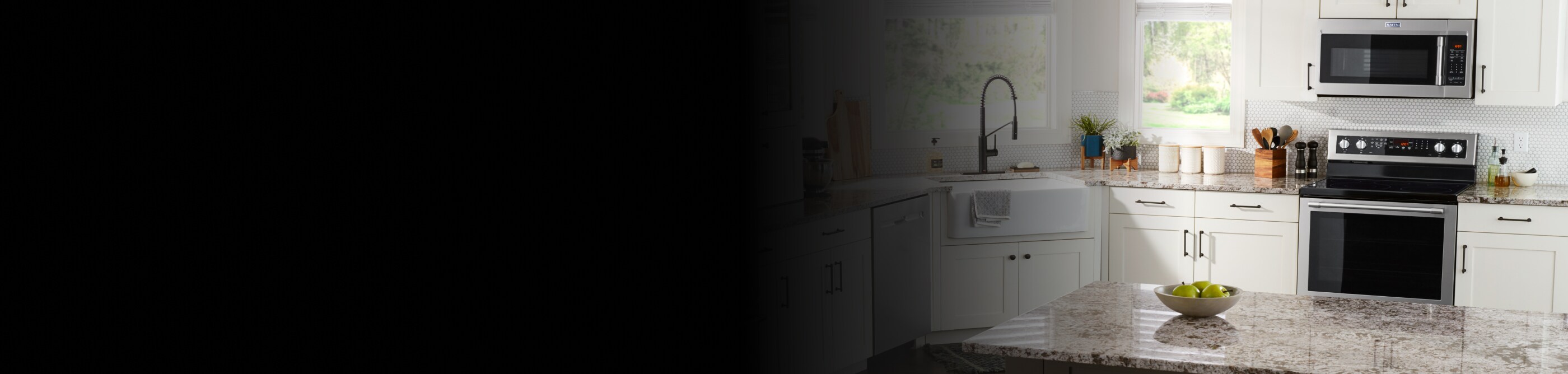 View of modern kitchen with Maytag brand appliances