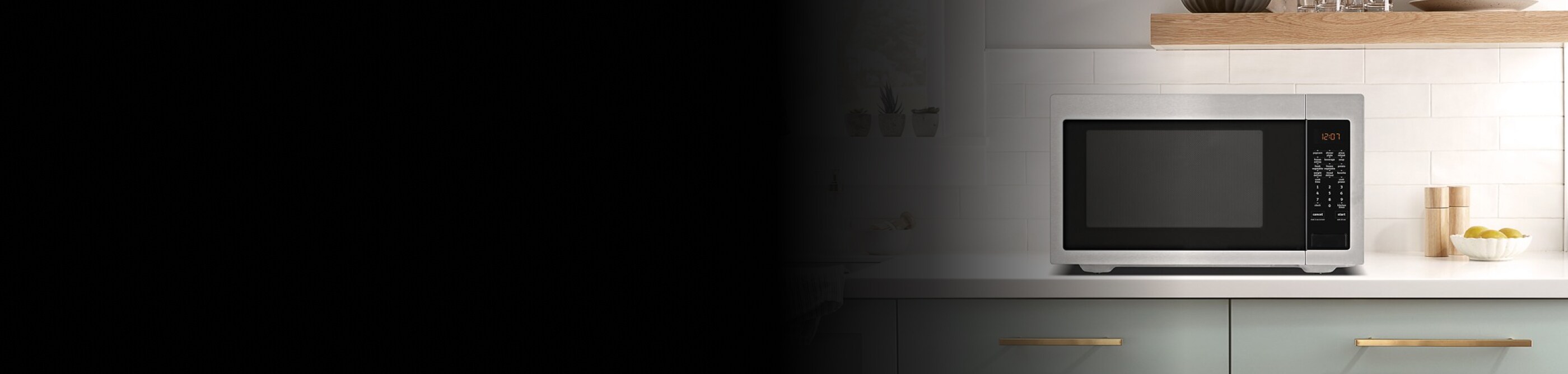 Stainless steel microwave on a countertop