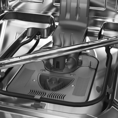 Stainless steel dishwasher tub with spray arm and heating element