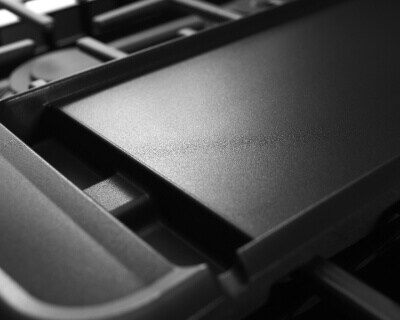 Griddle positioned on a range