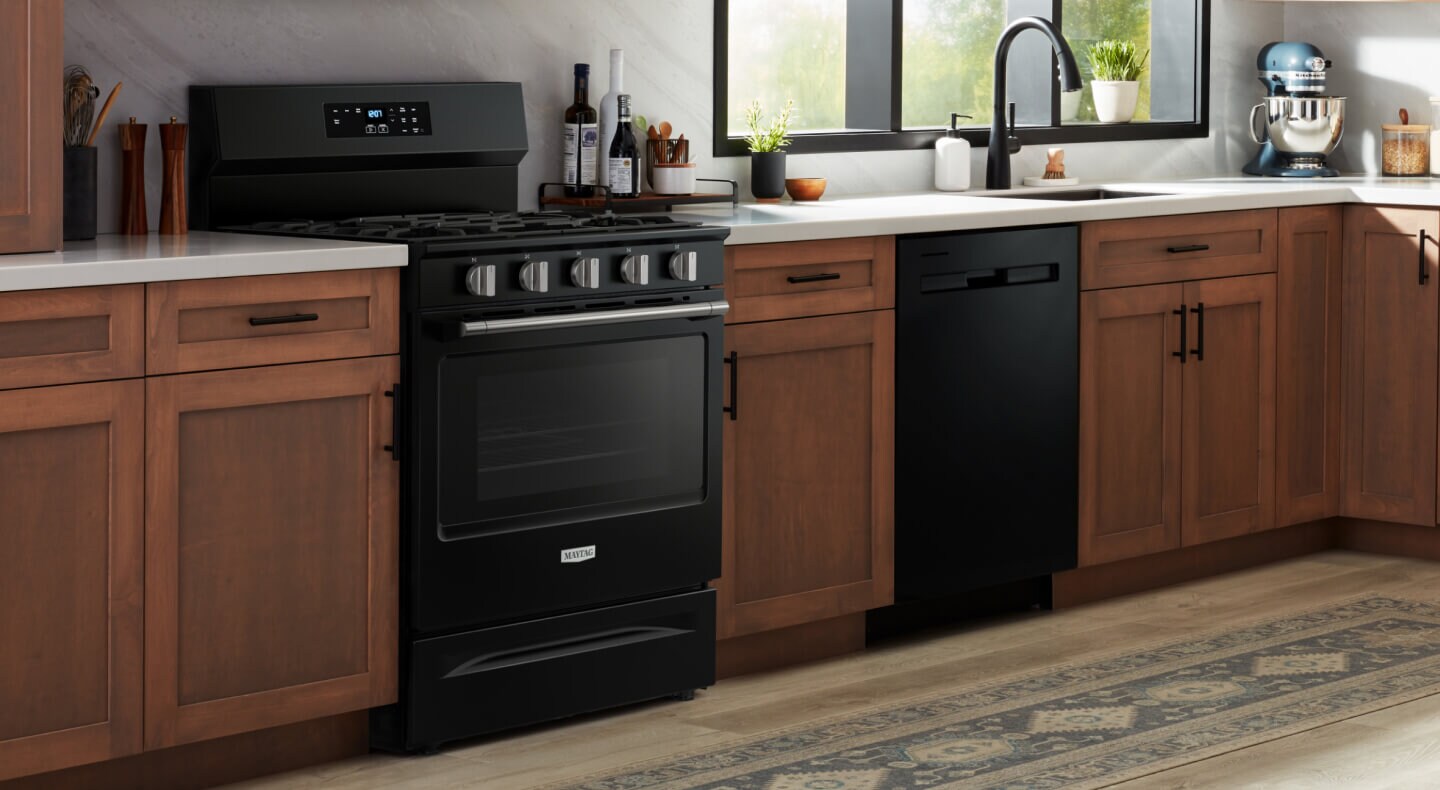 Maytag® range set in a brown kitchen