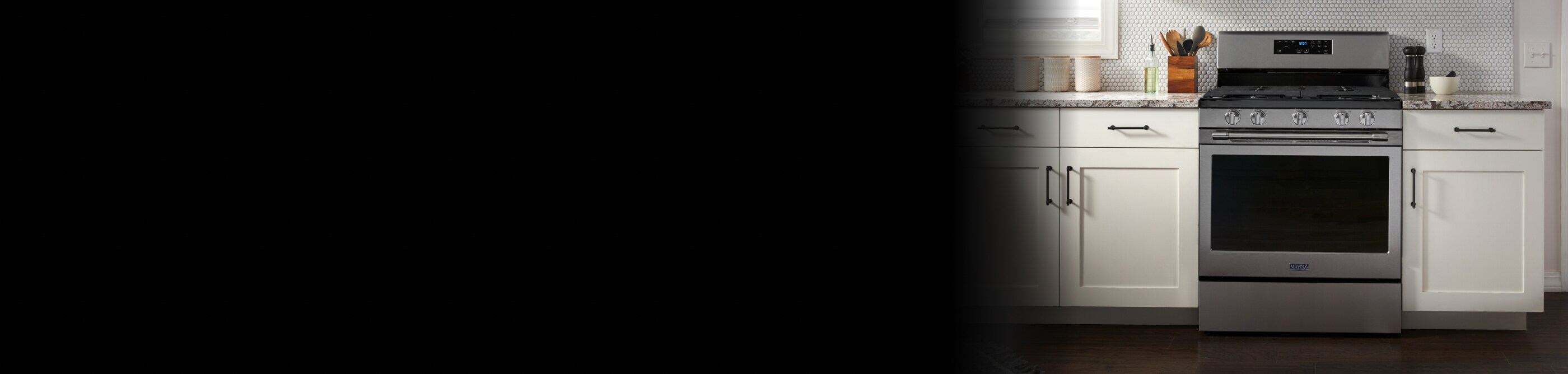 A Maytag® air frying oven set in white cabinetry