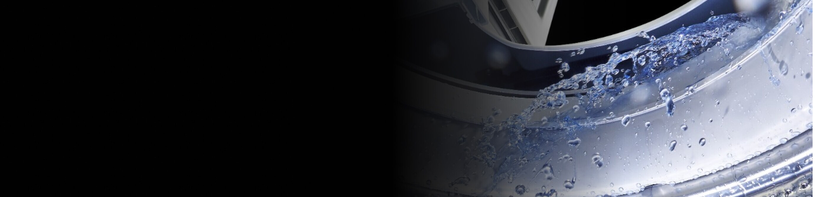 A close-up of the interior of a Maytag® washer tub with water