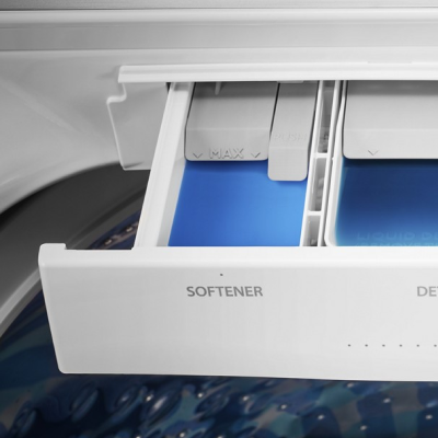 Close-up of full fabric softener dispenser