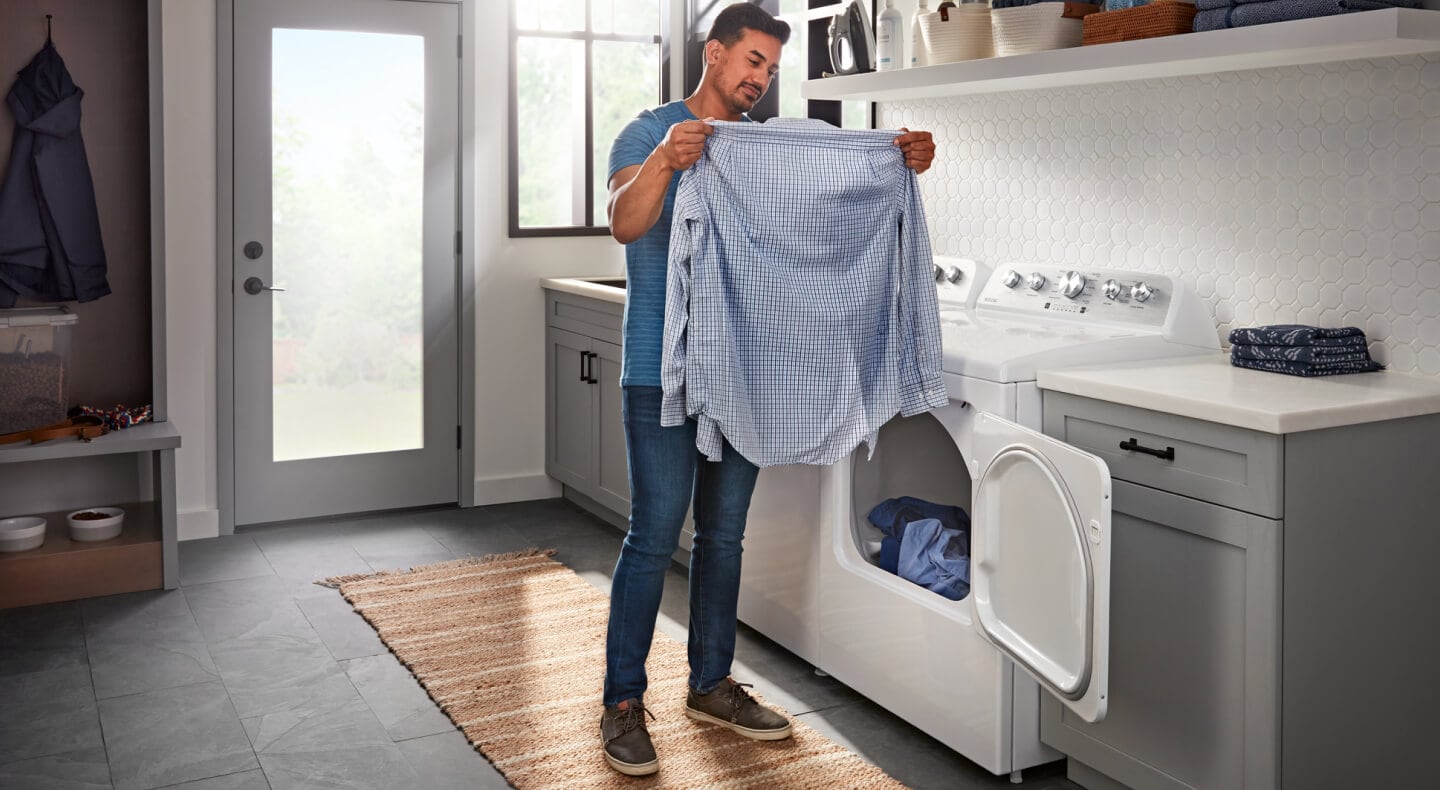 Person inspecting clean item Person inspecting clean item