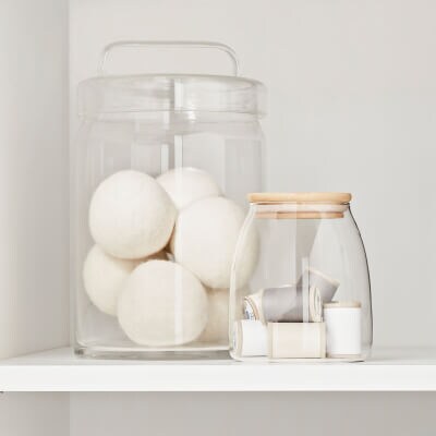Glass jar with wool dryer balls