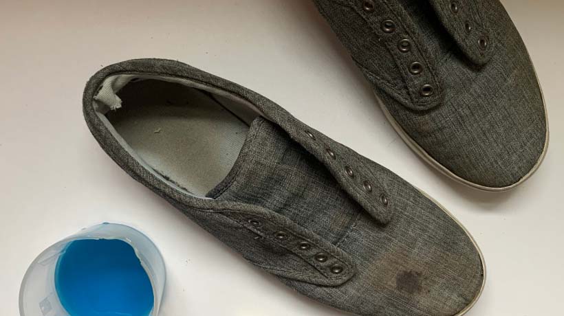 Overhead view of shoes and dish soap 