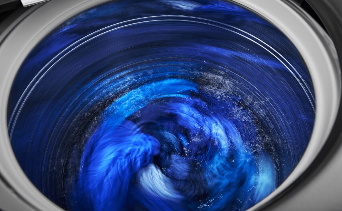 Wet blankets spinning in a washer