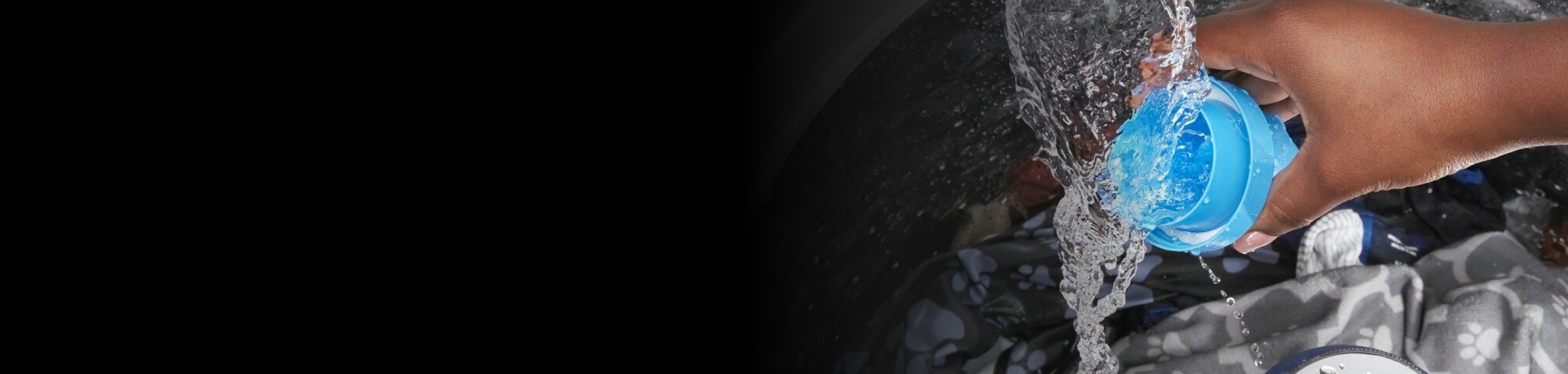 Hand rinsing a detergent cup in built-in faucet