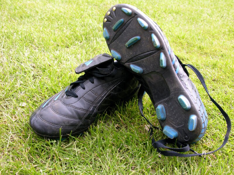 A photo of a pair of black cleats