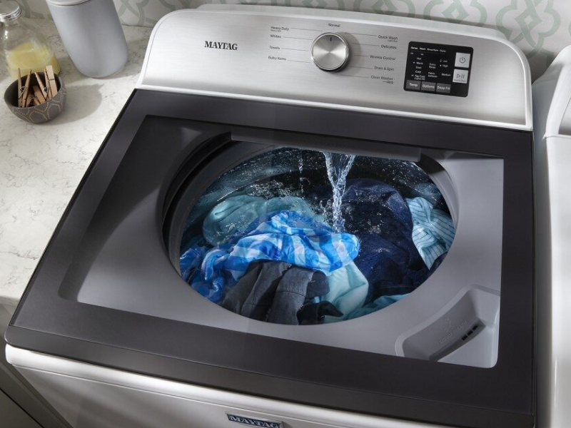A washer cleaning clothes A washer cleaning clothes