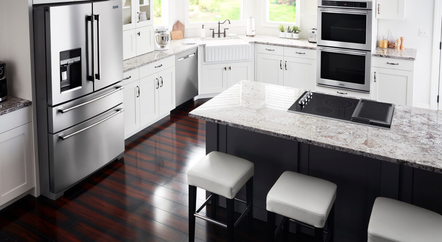 Suite of Maytag® French door refrigerator, double oven and electric stovetop Suite of Maytag® French door refrigerator, double oven and electric stovetop