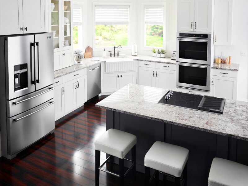 Suite of Maytag® French door refrigerator, double oven and electric stovetop Suite of Maytag® French door refrigerator, double oven and electric stovetop