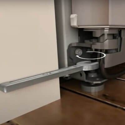 Wrench rotating leveling leg on refrigerator