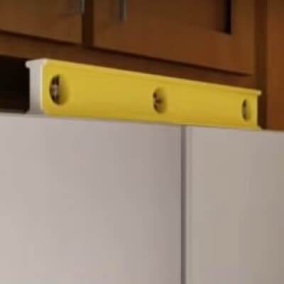 Leveler on the top of a refrigerator