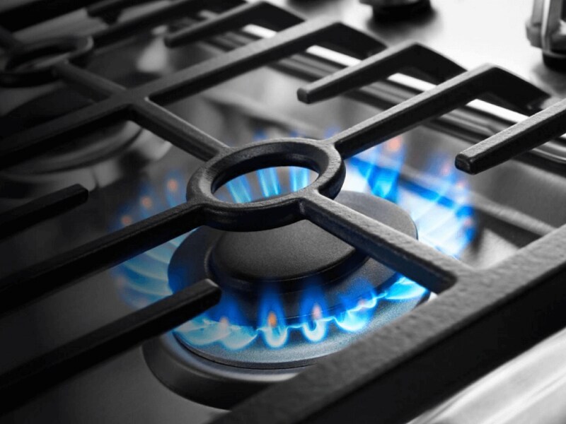 The gas cooktop of a Maytag® Gemini® stove