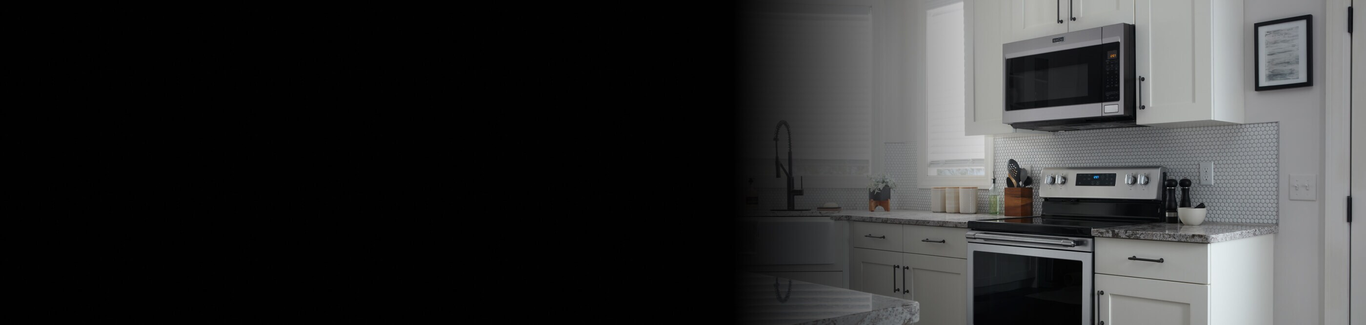 Maytag® electric range and over-the-range microwave in modern kitchen
