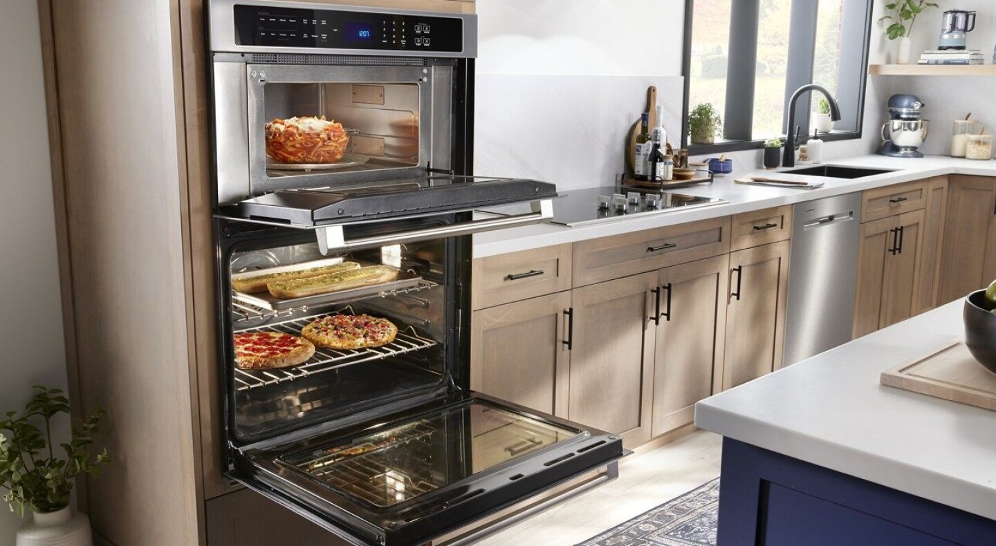 Maytag® combination wall oven cooking multiple dishes