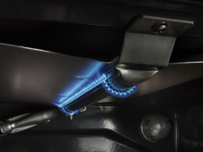 Gas heating element inside an oven