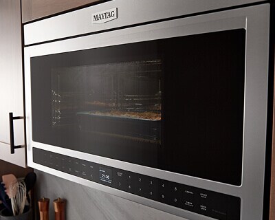 Maytag® over-the-range microwave with dish cooking inside