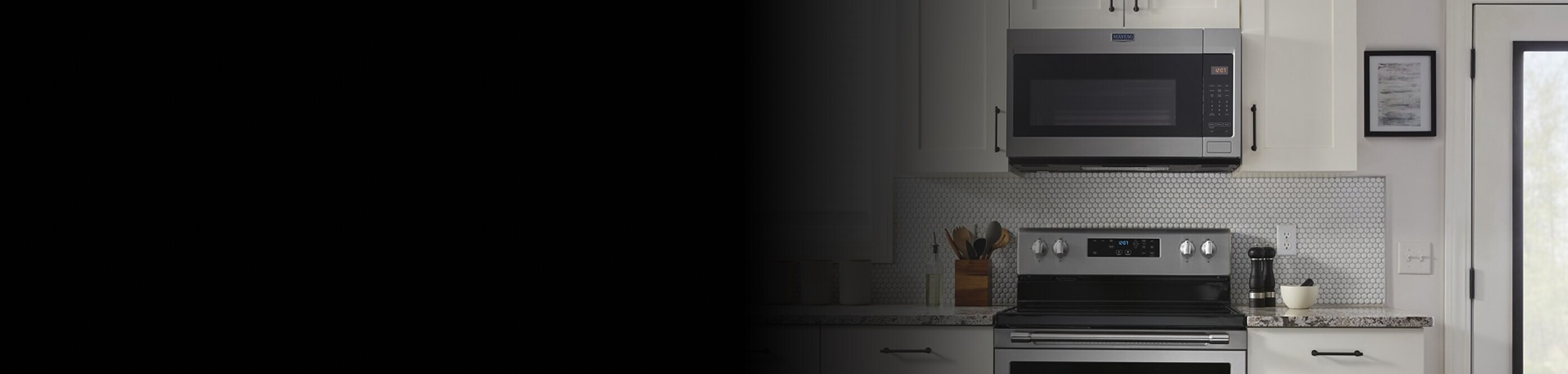 Maytag® over-the-range microwave above a Maytag® electric range