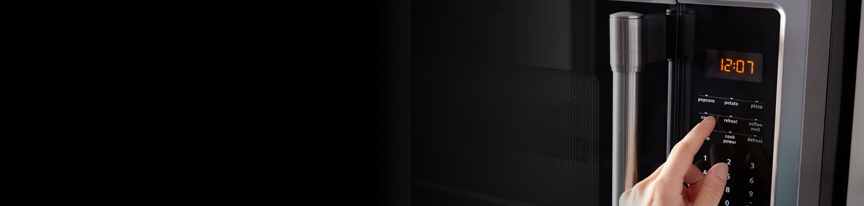 Close up image of a black microwave