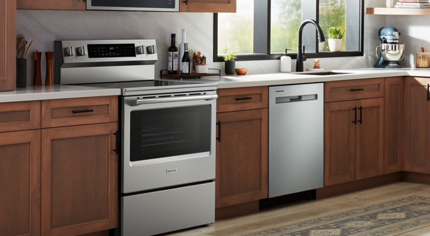 Maytag® electric range in a rustic kitchen