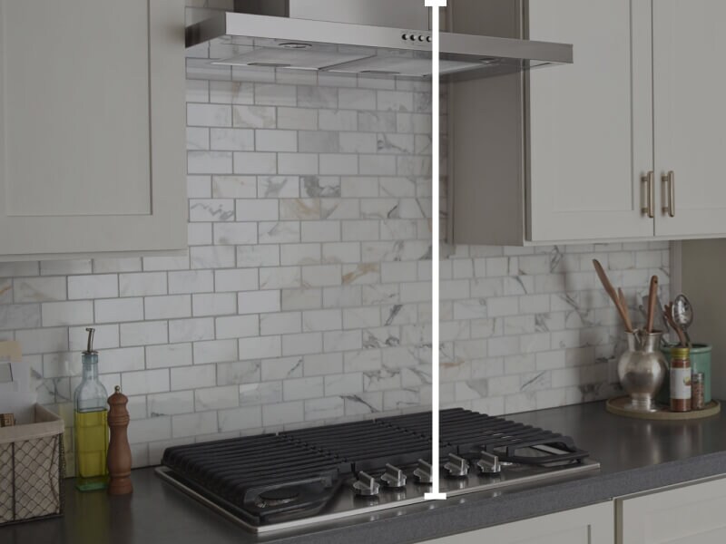 Range hood over cooktop with marks showing how to measure vertically