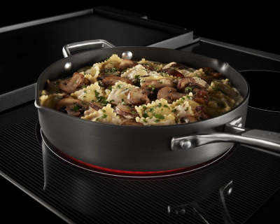 Pan full of ravioli cooking on the stovetop