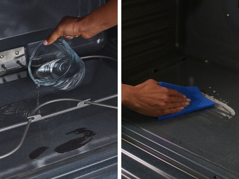 A person cleaning the inside of an oven A person cleaning the inside of an oven