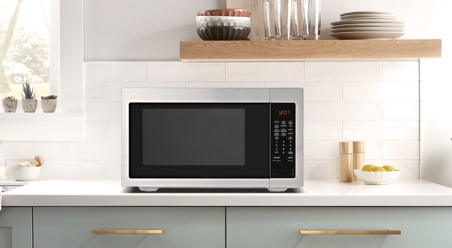 A Maytag® microwave setting on a countertop