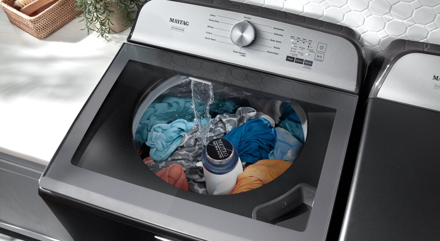 Maytag® washing machine with laundry inside