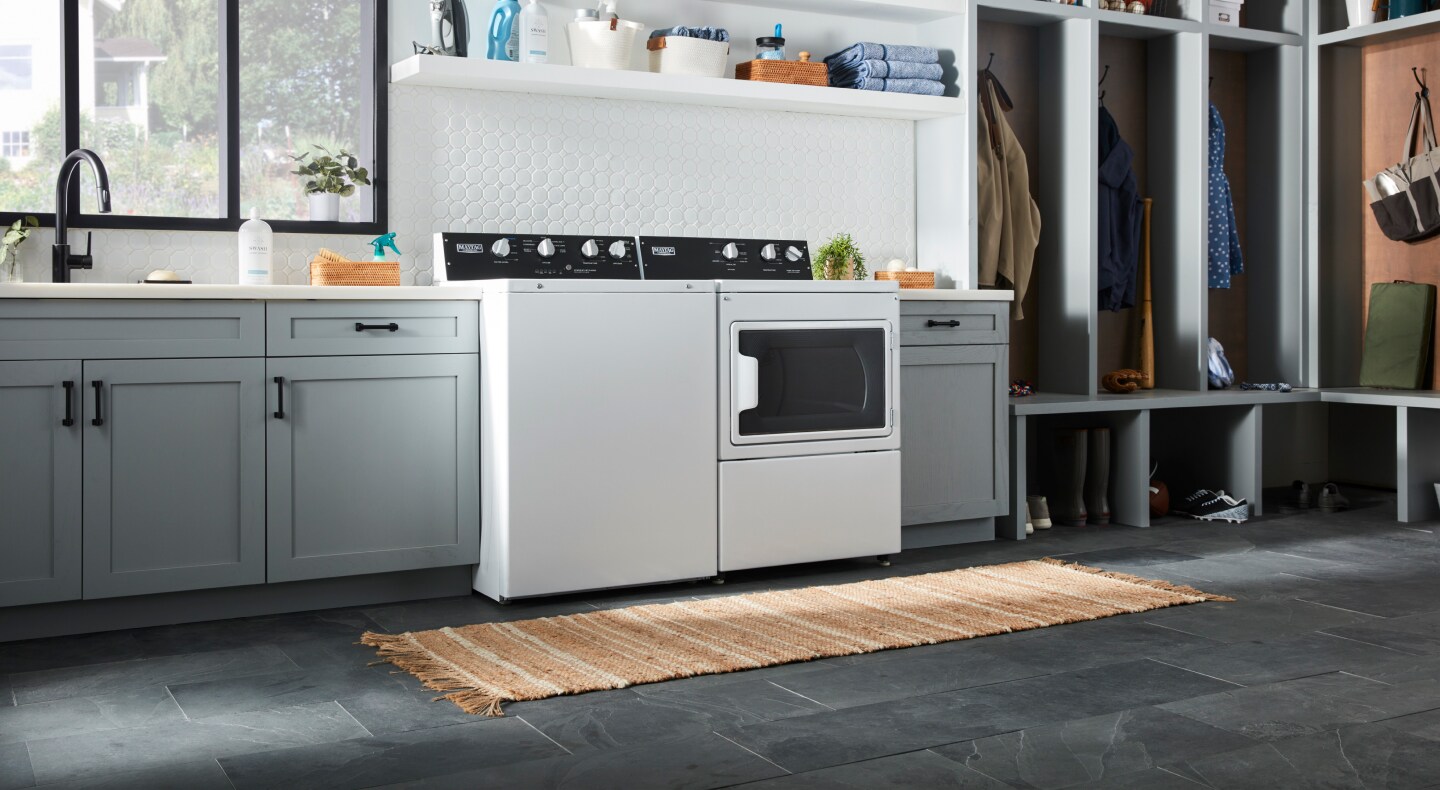 Maytag® commercial-grade washer and dryer in a laundry room