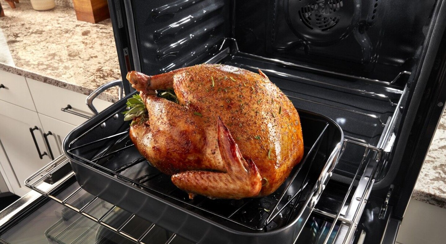 Cooked turkey in open oven Cooked turkey in open oven
