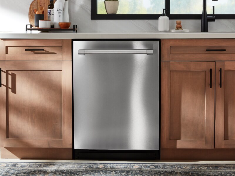 The front of a closed top control dishwasher