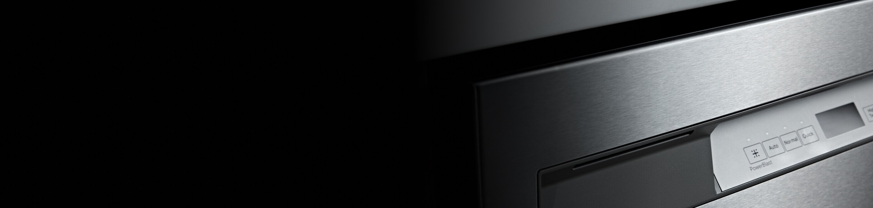 Close-up of the control panels on the front of a dishwasher