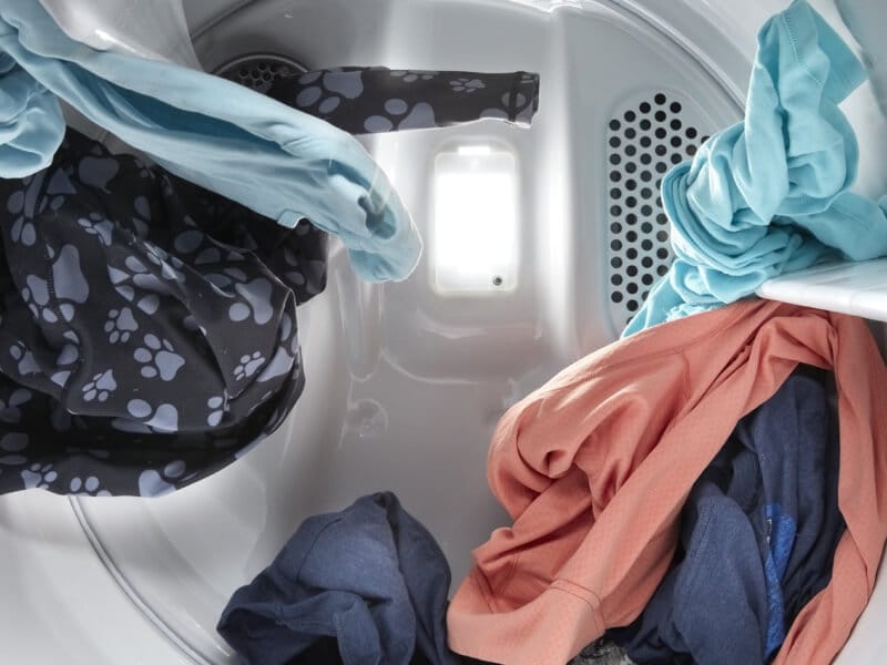 A closeup of clothes inside a dryer A closeup of clothes inside a dryer