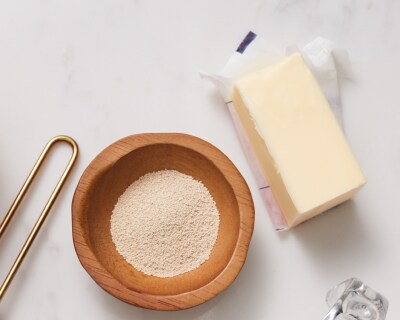 Stick butter next to a dish