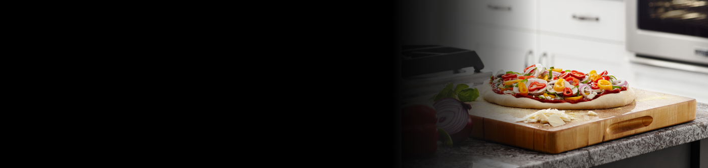 Homemade pizza on a cutting board